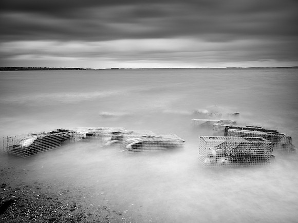 lobster traps in the surf